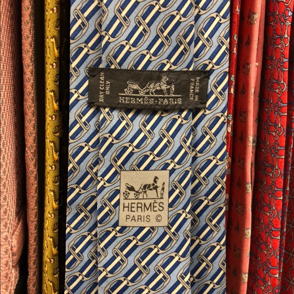 Hermès tie. Stirrups and stripes.